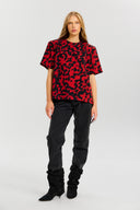 Top Palmer in red abstract