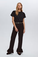 Black ruffle trousers