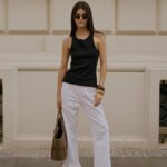 Kremowe spodnie z falbaną