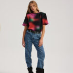Margo top in blurred meadow